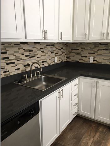 Sink with faucet in kitchen